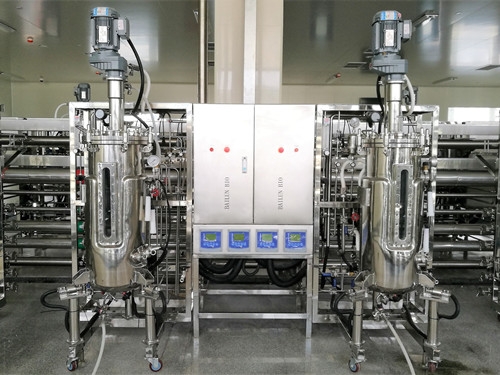 two conjoined  fermenters|bioreactors